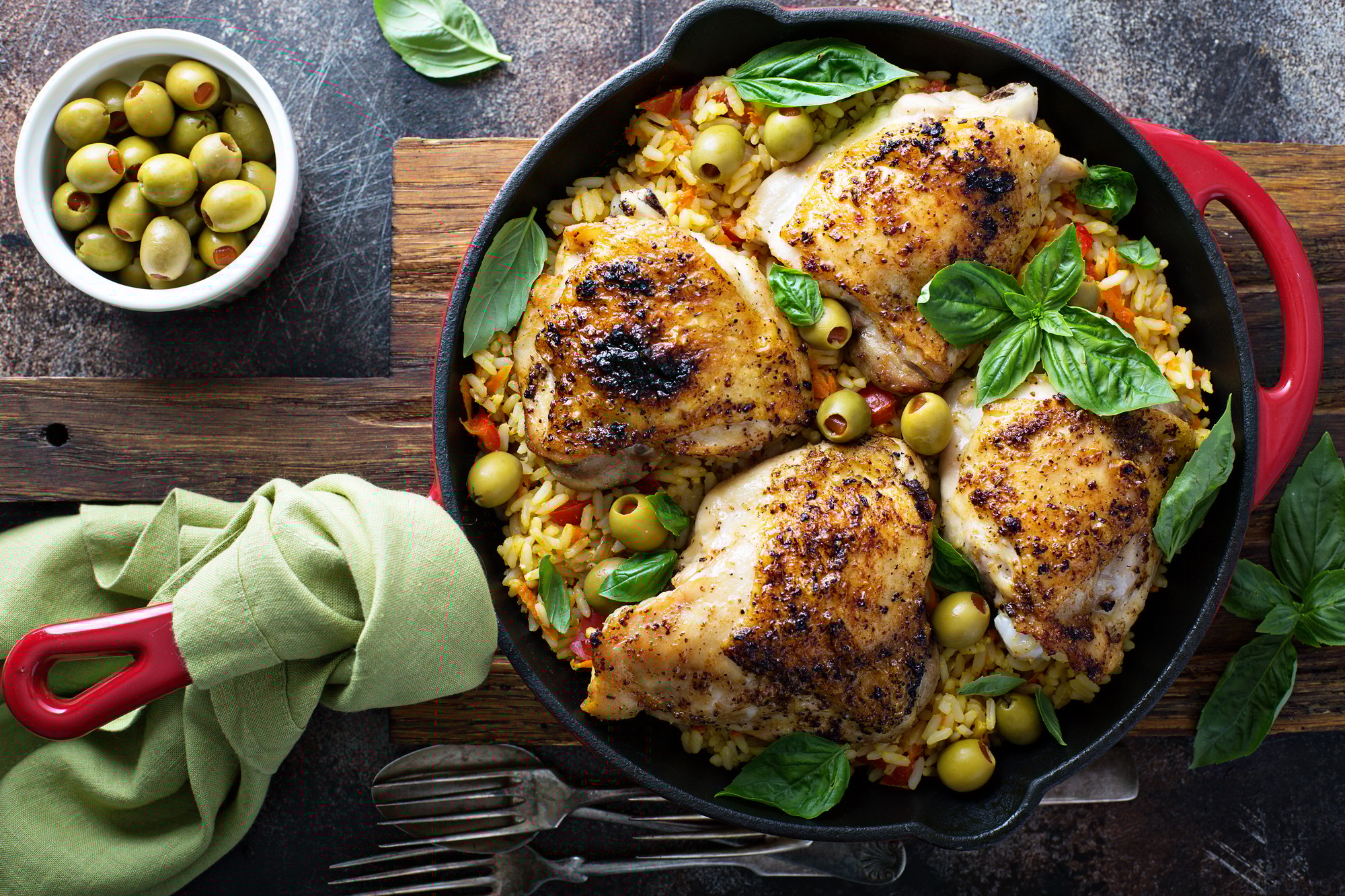 Roasted chicken thighs with rice and olives