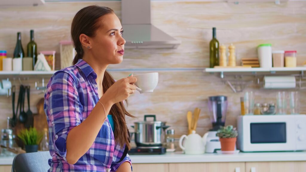 Drinking green tea at breakfast